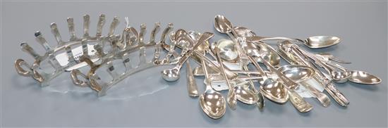 A pair of Adie Bros stylish silver toast racks and a collection of Georgian and later silver spoons, sugar tongs, etc.